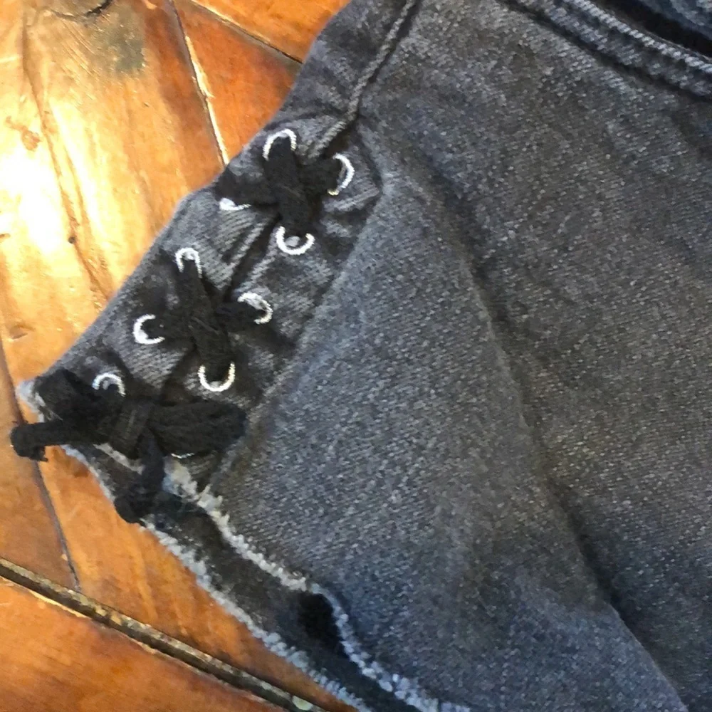Levi’s girls black denim shorty shorts with lace up sides